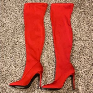 Over the knee red stilettos